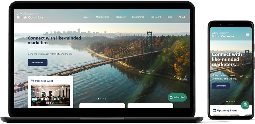 A website mockup with a laptop and mobile phone displaying the custom designed home screen of the BCAMA website.