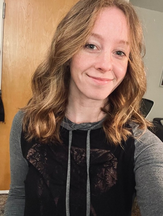 Profile photo of the owner showing a woman with medium length hair smiling at the camera